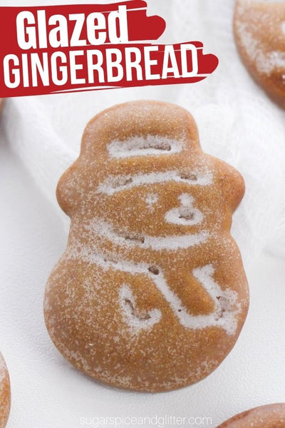These delicious gingerbread cookies are so cute, they look like they came from a package! Easy Glazed Gingerbread Cookies with a pretty vanilla glaze are an essential addition to your Christmas baking this year!