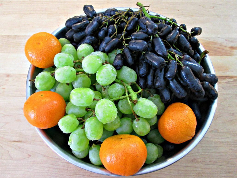 Black seedless Noir grapes, green grapes and Mandarin Oranges.Homemade Wine