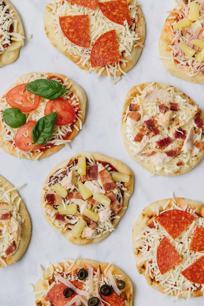This Mini Naan Pizza is so easy to make, kids won’t just love eating them, but they’ll love helping to make them, too!